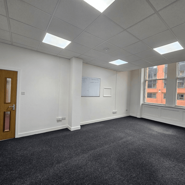Rent Unit 114 at Method Spaces: a stylish office with 5 desks, high ceilings, and natural light on Portland Street, Manchester.