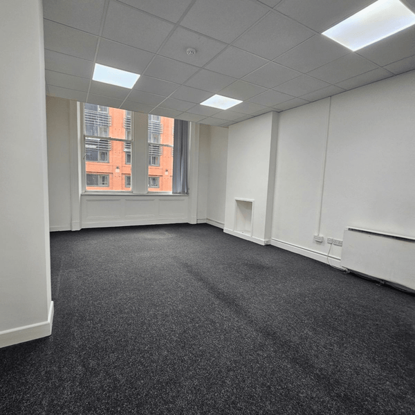 Method Spaces Unit 114 for rent: modern office with 5 desks, high ceilings, natural light, and included furniture in Manchester.