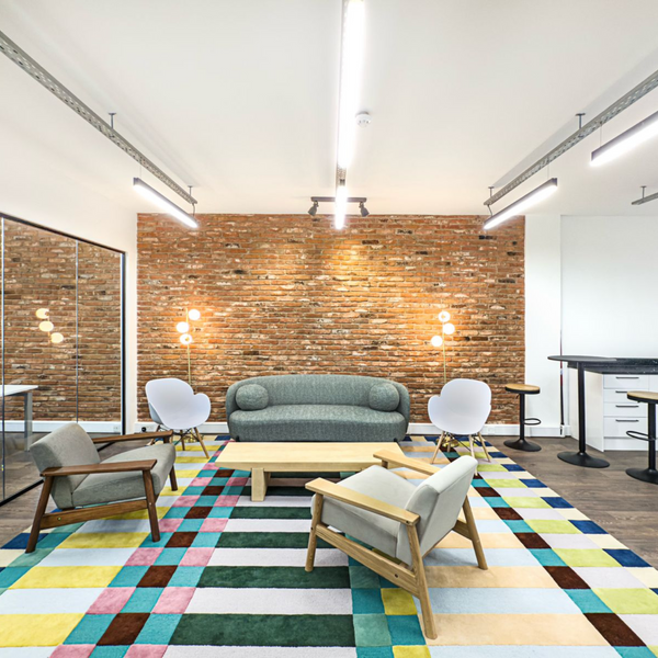 A bright, clean break out common area in a serviced office, fully furnished and spacious.