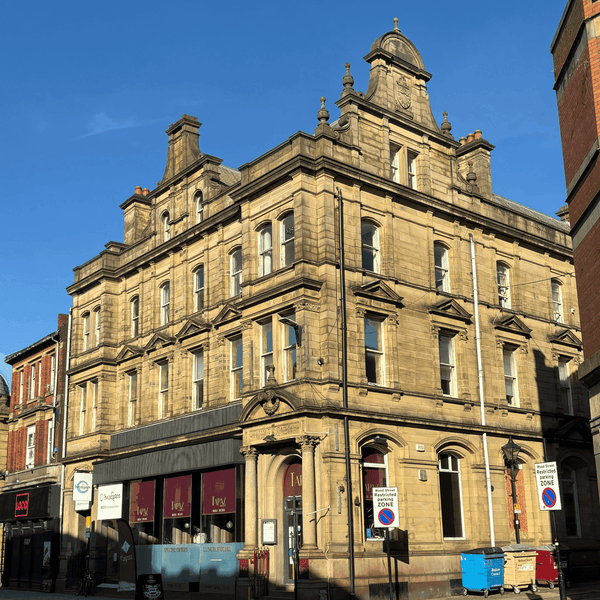 The Bradshaw Gate Building in Bolton features serviced offices, visible from the exterior view of the structure.