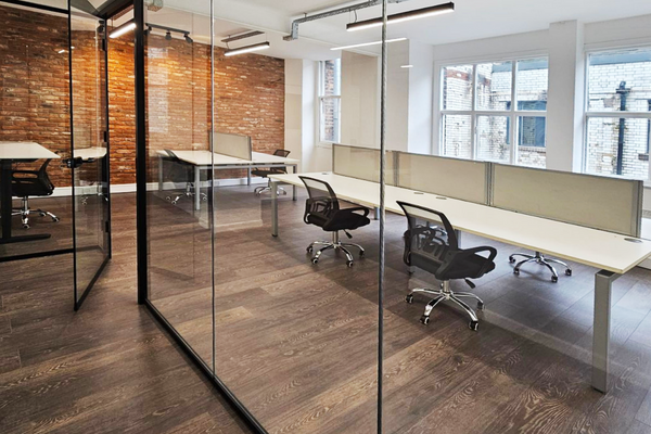 7 desks serviced office for rent in Portland Street, Manchester. 