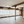 Whole office floor for rent in Manchester, UK. Large industrial-style room with wooden floors, exposed beams, and large windows.
